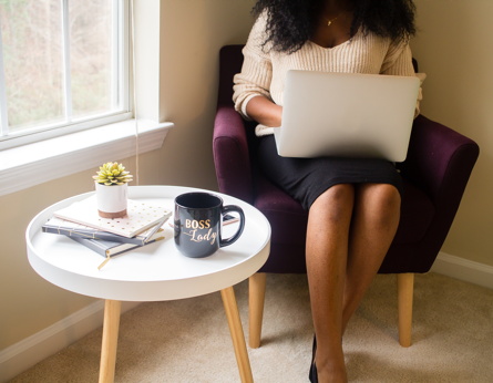 woman sitting at a computer